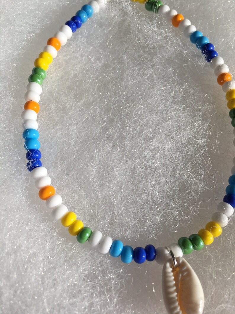 Cowrie shell anklet multicolor seed beads white yellow blue green