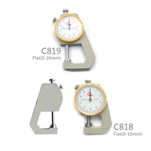 May include: Two dial calipers with a gray metal body and yellow dial faces. The top caliper is labeled "C819 Flat(0-20mm)" and the bottom caliper is labeled "C818 Flat(0-10mm)".