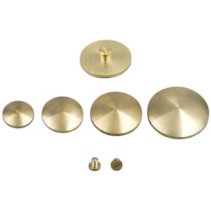 May include: Set of six brass furniture feet, including four round feet and two screw-on feet. The round feet are in various sizes, with the largest being approximately 3 inches in diameter.