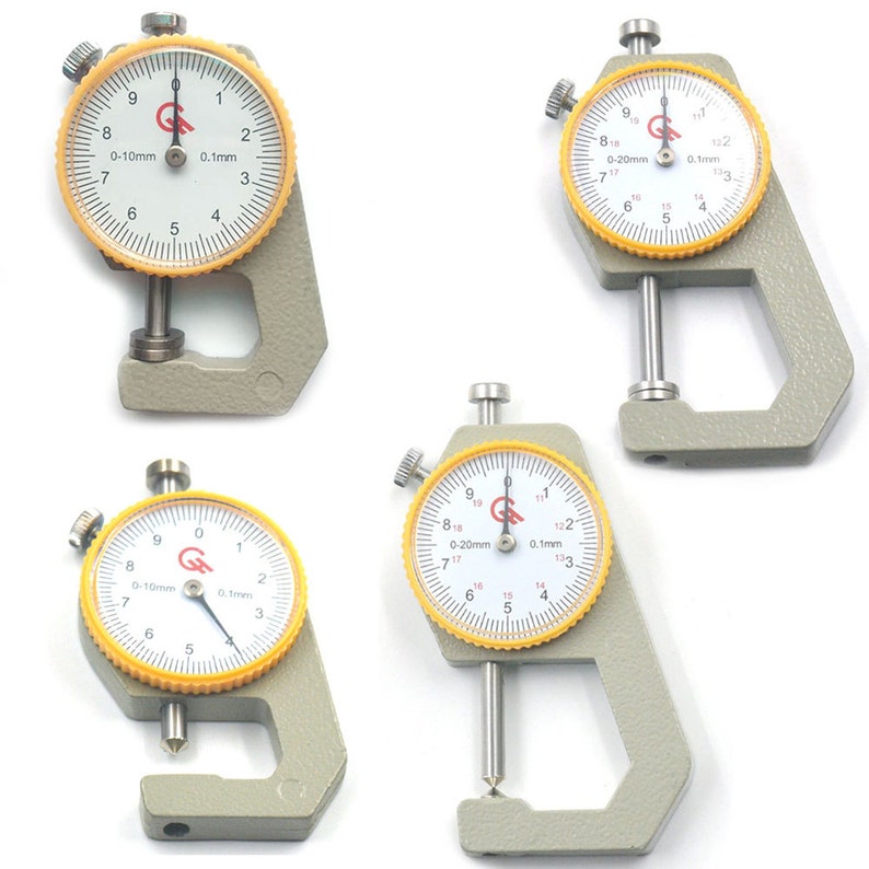 May include: Four silver and yellow dial calipers with a measurement range of 0-10mm and 0-20mm. The calipers are used to measure the inside diameter of objects.