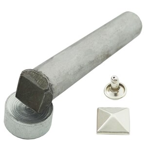May include: A silver metal tool for setting square pyramid-shaped studs. The tool includes a hammer, a base, and a stud. The stud is silver and has a square base with a pyramid-shaped top.