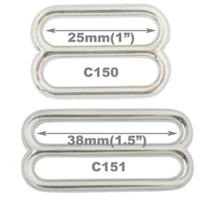 May include: Two silver metal slider buckles. The top buckle is 1 inch (25 mm) wide and labeled C150. The bottom buckle is 1.5 inches (38 mm) wide and labeled C151.