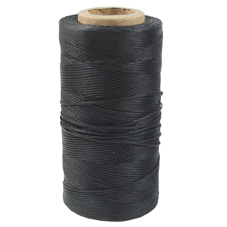 May include: A spool of black waxed thread for leather crafting.