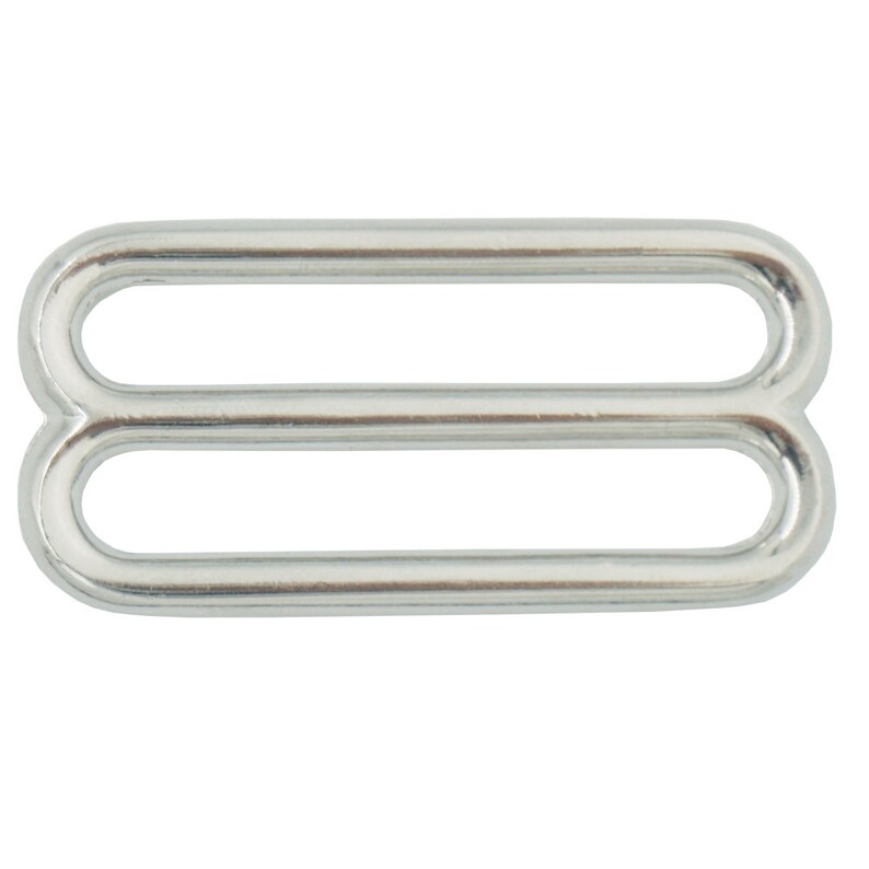 May include: Silver metal slider buckle with two loops.