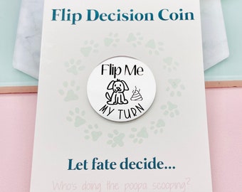 May include: A white card with the text "Flip Decision Coin" and a silver coin with a dog and poop illustration and the text "Flip Me My Turn". The card also has the text "Let fate decide... Who's doing the poopa scooping? Who's going for walkies? @makeitpersonalengraving"