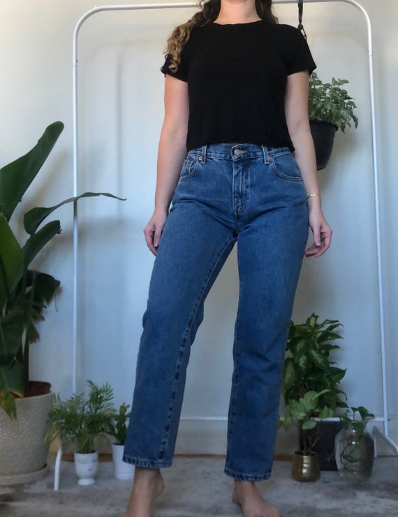 VINTAGE Levi 550 Darker Medium Wash 