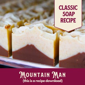 May include: A close-up of several bars of soap with a brown, white, and yellow layered design. The soap is labelled "Mountain Man (this is a recipe download)" and "Classic Soap Recipe".