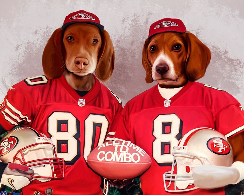 May include: Two dogs wearing red football jerseys with the number 80, matching caps, and holding helmets and a football. The football has the text "ALL TIME COMBO". The jerseys have the NFL logo.