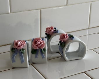 Vintage set of 5 ceramic pink floral napkin rings with blue bows