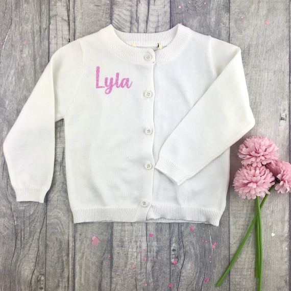 Personalised Girl s White Cardigan Pink Glitter Fancy Swirl Font