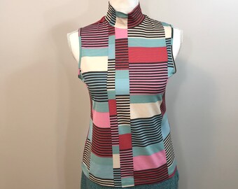 sleeveless mock turtleneck shell