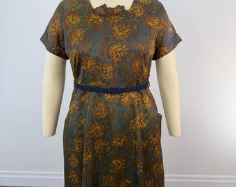 Vestido vintage de los años 60 con estampado floral en tonos otoñales, talla vintage estupenda.
