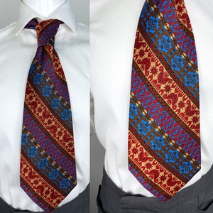 Vintage 1970s Egyptian Motif Polyester Brocade Tie in Red, Gold, Blue and Brown