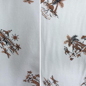 May include: White fabric with a repeating pattern of brown and black illustrations. The illustrations depict scenes with palm trees, people, and animals. The fabric has a vintage or retro aesthetic.