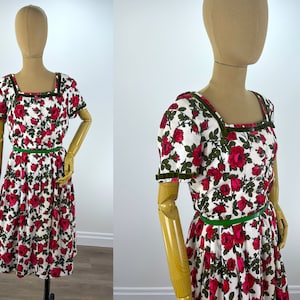 Vintage 1950s Red Rose Print Shirtwaist Dress with White Background. Pleated Skirt, Green Velvet Trim and a Pocket. Vintage Plus Size