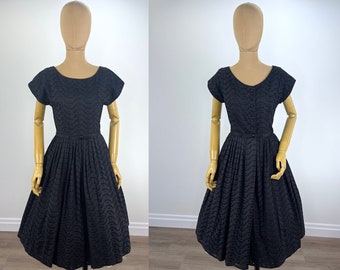 Vintage 1950s Black Cotton Embroidered Eyelet Shirtwaist Dress, Covered Buttons. 1950s Black Cotton Fit and Flare Dress with Pleated Skirt
