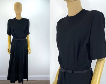 Vintage 1940s Black Wool Crepe Handmade Tea Length Cocktail Dress.  Simple and Elegant.  Seven Panel Skirt