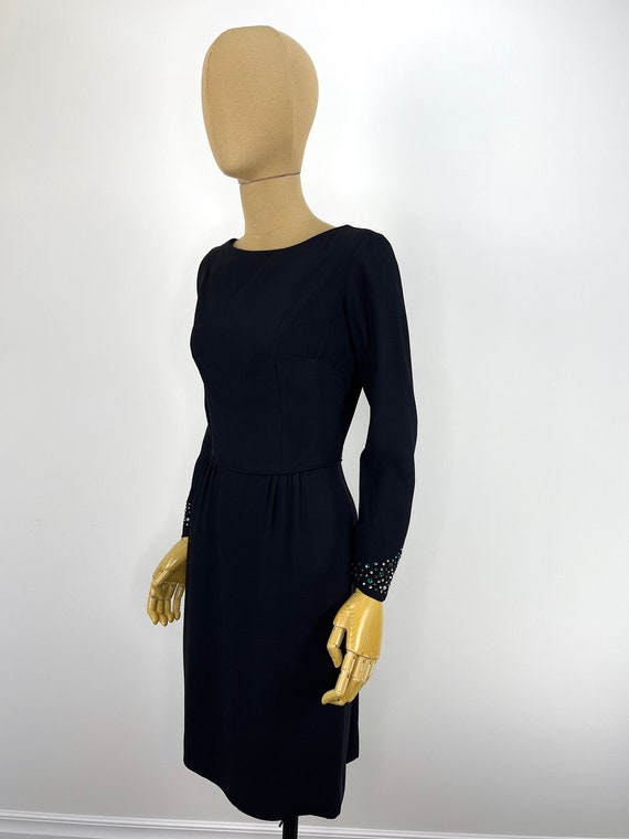 Vintage Late 1950s/Early 1960s Black Crepe Wiggle Dress, Green, Blue, White & Champagne Rhinestone Sleeve Embellishment. Little Black Dress