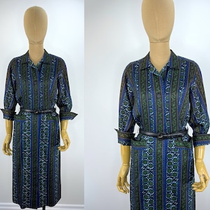 Vintage Early 1960s Shirtwaist Dress in a Blue and Green Floral and Striped Print.  Great Large Pockets Detail and Turn Up Cuff