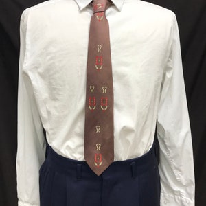 Vintage Late 1950s/Early 1960s Chocolate Brown with Red Brackets and Cream Feather/Leaf Silk Tie. Late 1950s/Early 1960s All Silk Tie.