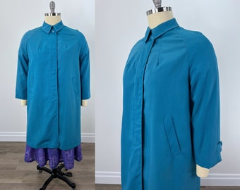 Vintage jaren 1960 Turquoise Raglan Press nooit lichtgewicht jas van Wumsutta Never Press Fabric. Grote vintage maat