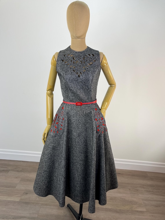 grey dress red belt Grey slim-cut dress with red details
