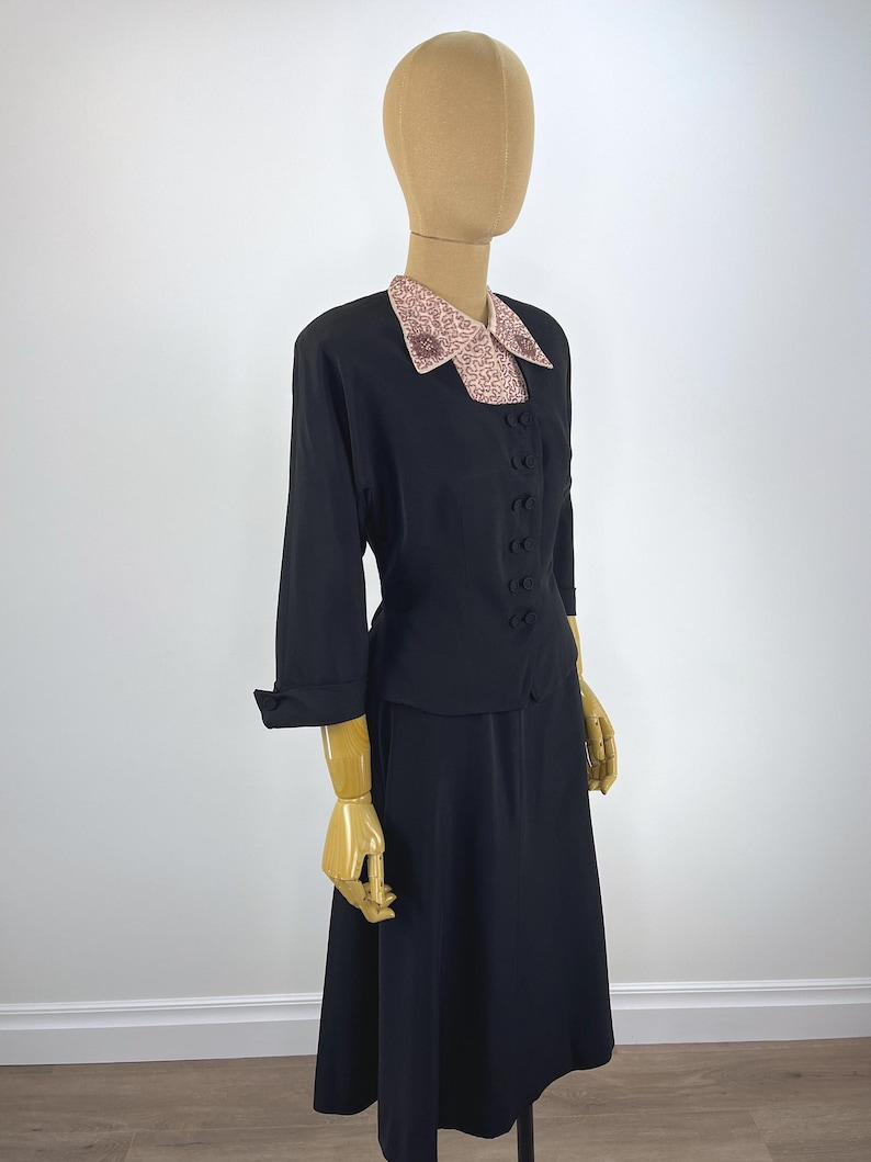 Black Faille Evening Jacket Nipped Waist Design Vintage 1940s 1950s Formal Suit Beaded Dickie Collar Two Piece Cocktail Attire Pearl Seed Bead Embellished Details Retro Style A Line Skirt Set Authentic Period Fashion Double Button Closure