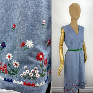 Vintage 1960s Blue Sheath Dress with Multi-Colored Floral Embroidery at the Hem