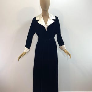 Vintage Black Velvet Maxi Dress 1940s Evening Gown Formal Wear Original Period Piece Ivory Satin Collar Wide Lapel Detail Fitted Bodice Gathered Skirt Special Occasion Attire Cocktail Party Dress Elegant Retro Fashion Classic Style Designer