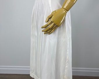 Vintage 1960s Off-White Acetate Half Slip with Metal Zipper and Adjustable Button Closure. Originally Made for Anna Frances Parker.