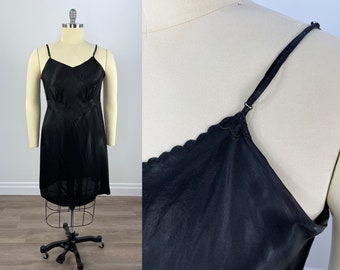 vintage années 1960 Black Rayon Slip, Taille 44 par Laros Dimensional