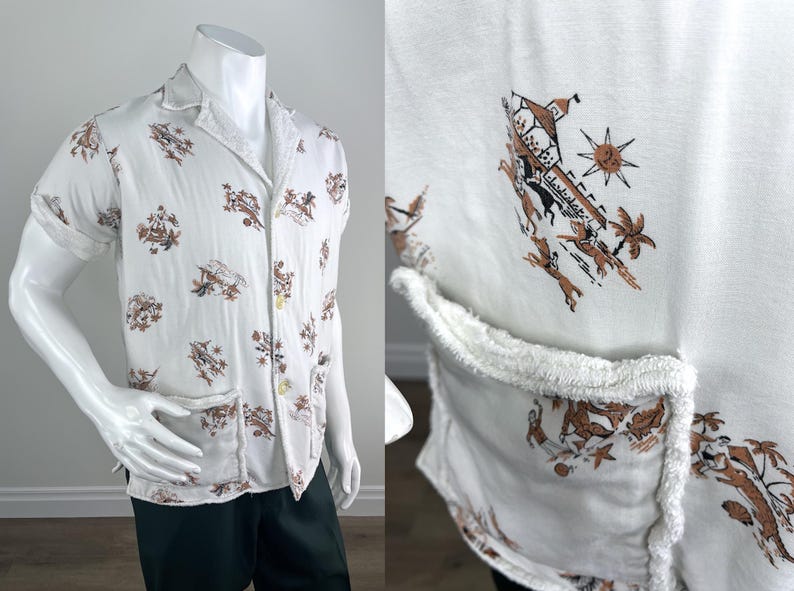 May include: White short-sleeve shirt with a camp collar and a brown and tan print. The shirt has two front pockets and a button-up closure. The print features various figures and shapes.