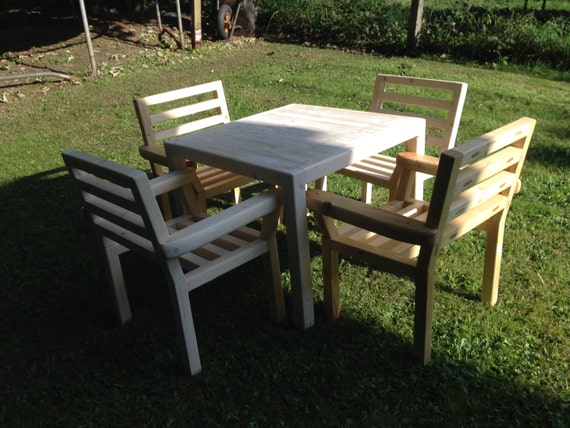 kids wooden table and 4 chairs