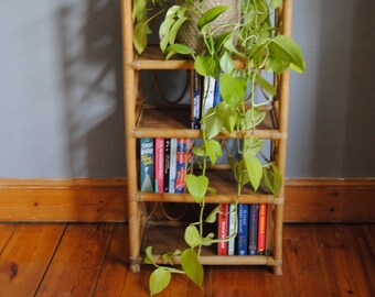 Vintage 1980’s four tier floor standing bamboo shelving unit bookcase