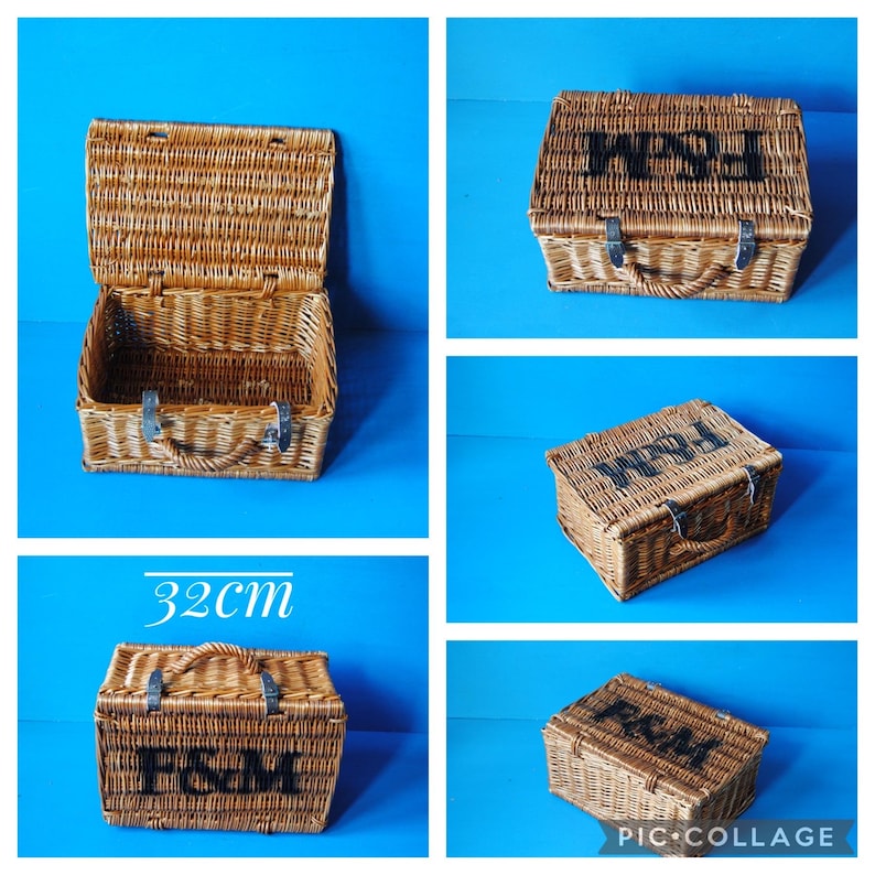 A collage showing 32cm Fortnum and Mason willow picnic basket from multiple angles. The basket is sitting on a blue surface, with the Fortnum and Mason logo visible at the top. The basket has an integrated willow handle to the front, plus a hinged lid that has two leather straps to hold the lid securely in-place