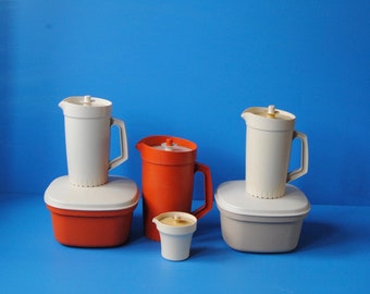 Vintage Tupperware containers - Microwave steamer in orange or taupe and tall pitcher in orange. Vintage kitchen utensils