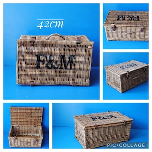 A collage showing 42cm Fortnum and Mason willow picnic basket from multiple angles. The basket is sitting on a blue surface, with the Fortnum and Mason logo visible at the top. The basket has an integrated willow handle to the front, plus a hinged lid that has two leather straps to hold the lid securely in-place