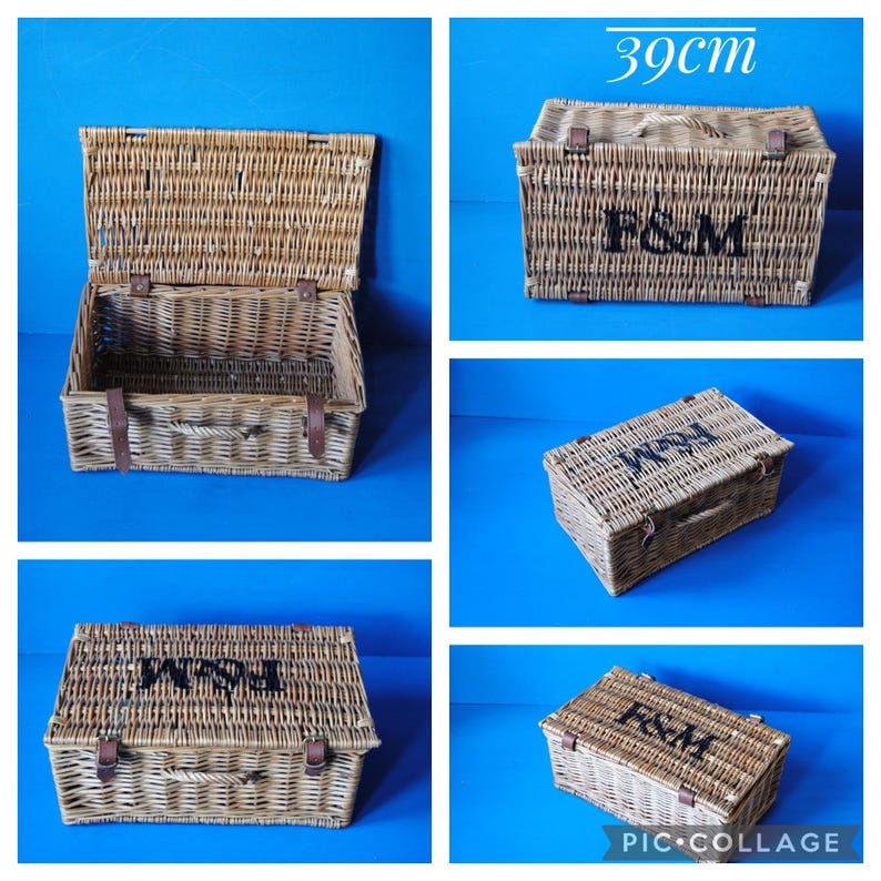 A collage showing 39cm Fortnum and Mason willow picnic basket from multiple angles. The basket is sitting on a blue surface, with the Fortnum and Mason logo visible at the top. The basket has an integrated willow handle to the front, plus a hinged lid that has two leather straps to hold the lid securely in-place
