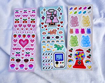 3 pegatinas retro con píxeles brillantes