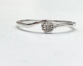 Diamond Solitaire Twist Ring Crafted In Sterling Silver