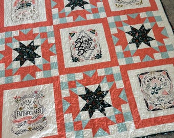handmade Quilt in orange and blue