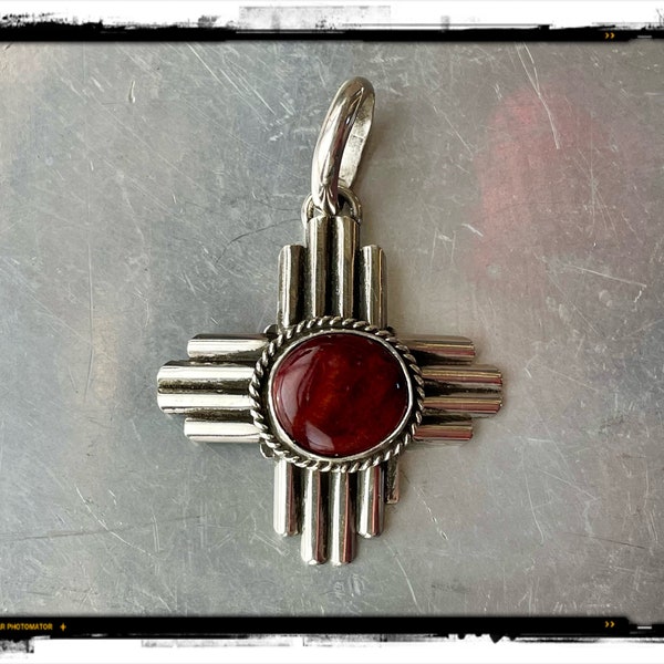 Native American sterling silver Zia Symbol pendant with "Purple Spiny Oyster" stone by R.  Yellowhorse