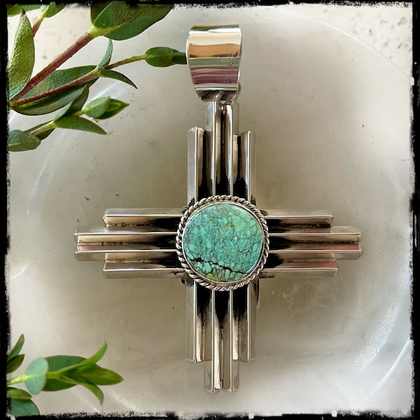 Native American large Zia Symbol pendant with turquoise by artist Robert Yellowhorse