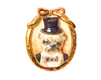 Broche de porcelana con forma de carlino, detalle de oro de 24 quilates, broche ovalado con camafeo de perro