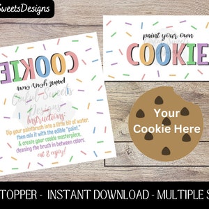 May include: A printable bag topper featuring a cookie design with colourful sprinkles. The text reads "Paint your own cookie" and includes instructions for decorating a cookie.