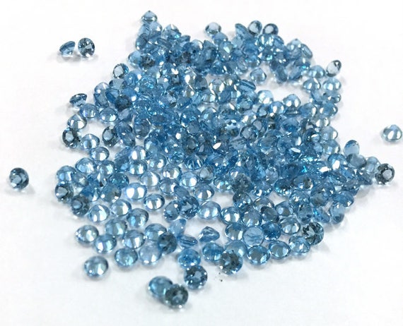 10 AAA Swiss Blue Topaz Gemstones: Faceted Round