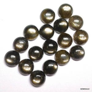 May include: A collection of 15 round, cabochon cut, black sunstone gemstones. The stones have a golden sheen and are approximately 10mm in diameter.