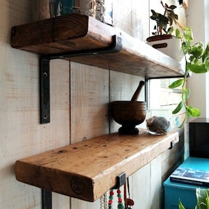 Solid reclaimed wood shelf with iron support, industrial/country style