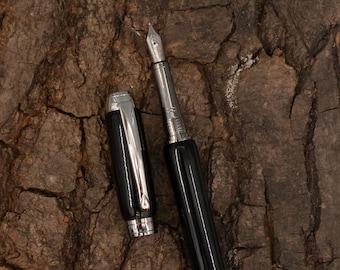 Mistral Fountain Pen in Rhodium and Black acrylic.