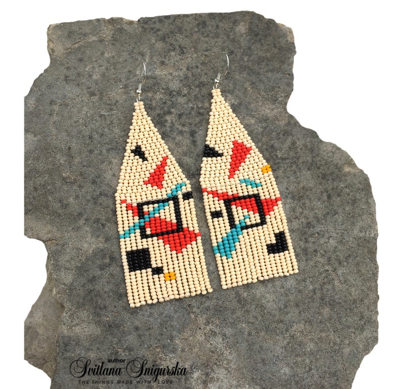 Abstract geometric seed bead earrings inspired by Bauhaus design, featuring ivory, black, red and turquoise color blocks with 18K gold-plated ear hooks.
